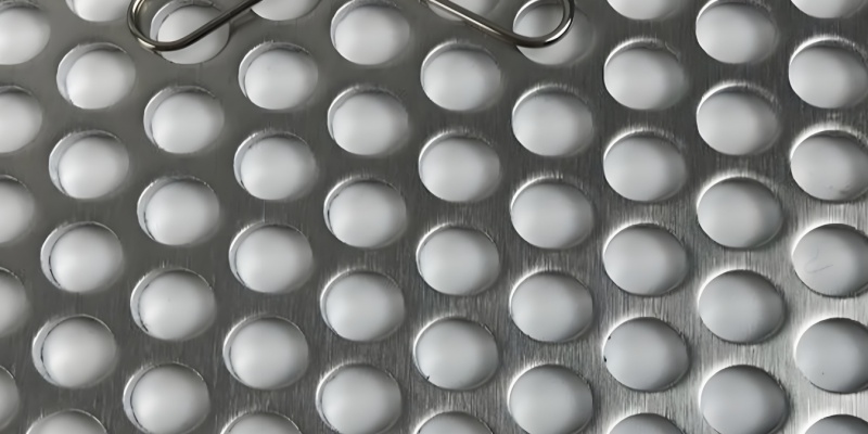 Perforated sheets with a smooth side