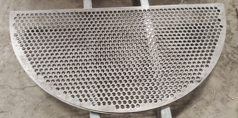 Perforated metal sheets after laser cutting